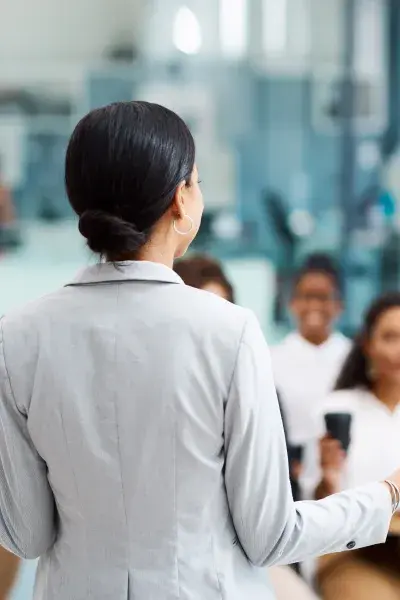 A person doing a conference.
